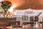 Botella de Champagne y cerezas Suites Perisur Apartamentos Amueblados Coyoacán