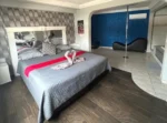 Cama de la Habitación Deluxe Hotel Luna Park Tijuana