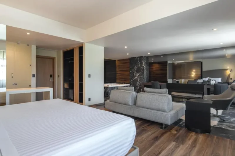 Cama de la Suite Deluxe Hotel Real del Rio Tijuana