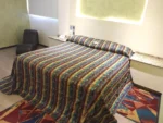 Cama de la suite Hotel Siesta del Sur Tláhuac