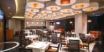 Restaurante con mesas del JF Grand Puebla