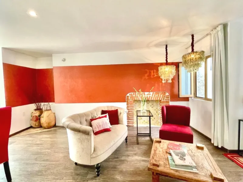 sala de estar con sofas Suite Principal El Sueño Hotel & Spa Puebla