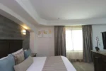 Suite Master Hotel Ticuán Tijuana con cama extragrande