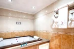 Suites Inn la Muralla Hotel & Spa Metepec con Jacuzzi en la Habitación